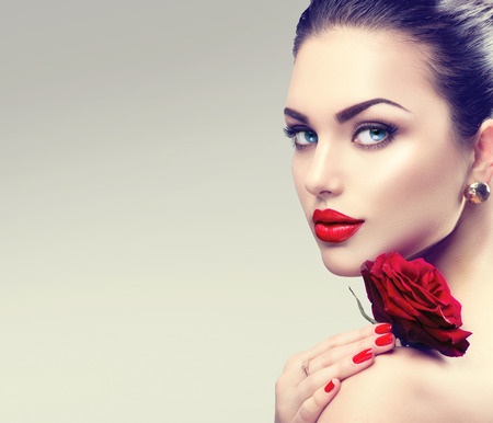51892338 - beauty fashion model woman face. portrait with red rose flower