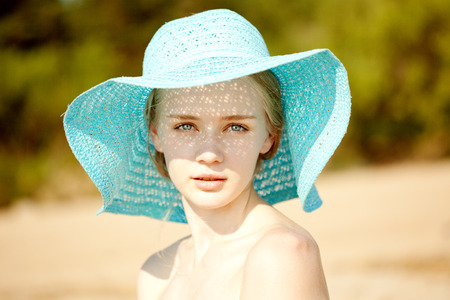 26593220 - beauty portrait of a beautiful woman in hat close-up