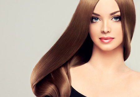 43817271 - girl model beauty with shiny long brown straight hair