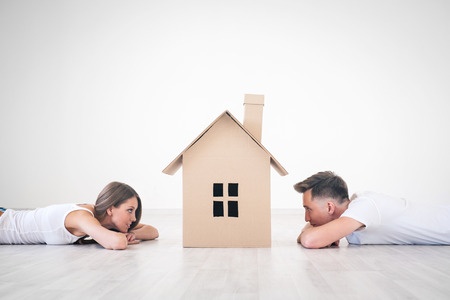 33445884 - daydreaming young couple at home
