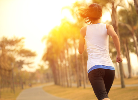 51285375 - woman running at tropical park